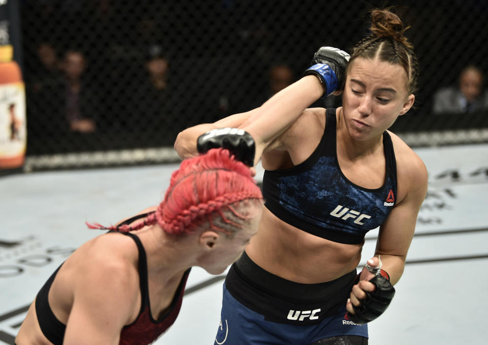 BOSTON, MASSACHUSETTS - OCTOBER 18:  (R-L) Maycee Barber and Gillian Robertson trade punches in their flyweight bout during the UFC Fight Night event at TD Garden on October 18, 2019 in Boston, Massachusetts. (Photo by Chris Unger/Zuffa LLC via Getty Images)