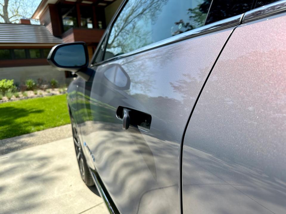 A close-up of the mechanical door handle on the Equinox EV