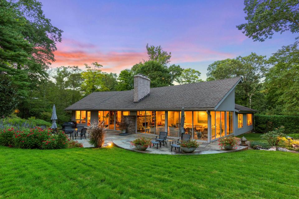 This four-bedroom contemporary in the Sterling Ridge section of Harrison features grounds designed by the landscape architect Armand Benedek in 1970 and then reshaped by another talented landscape designer who bought the property in 2004.