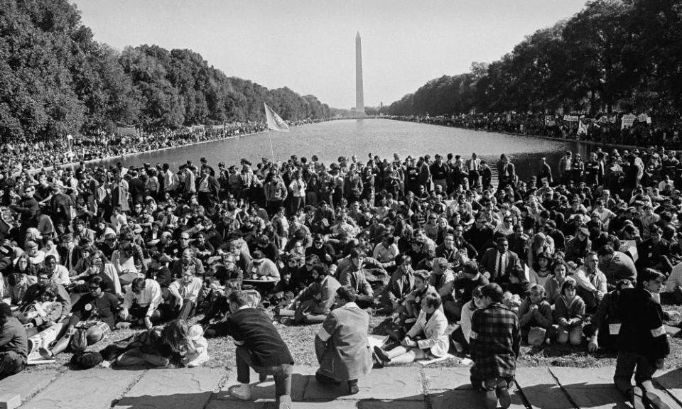 View of anti-Vietnam war protestors around the Lincoln Memorial reflecting pool on 21 October 1967.