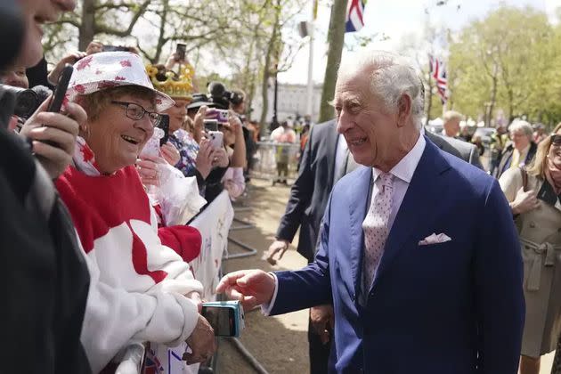 King Charles III greets wellwishers outside Buckingham Palace, in London, Friday, May 5, 2023 a day before his coronation takes place at Westminster Abbey.