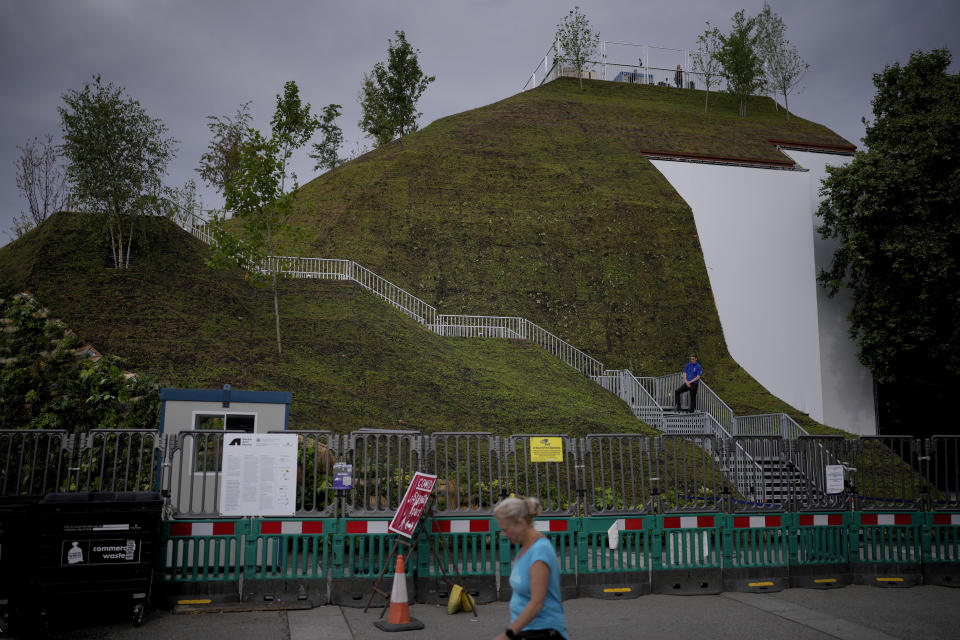 A view of the newly built "Marble Arch Mound" after it was opened to the public next to Marble Arch in London, Tuesday, July 27, 2021. The temporary installation commissioned by Westminster Council and designed by architects MVRDV has been opened as a visitor attraction to try and entice shoppers back to the adjacent Oxford Street after the coronavirus lockdowns. (AP Photo/Matt Dunham)