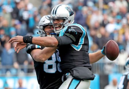 Nov 17, 2017; Charlotte, NC, USA; Carolina Panthers quarterback Cam Newton (1) and tight end Greg Olsen (88) celebrate a touchdown pass against the Green Bay Packers at Bank of America Stadium. Mandatory credit: Jim Matthews-USA TODAY NETWORK-Wisonsin