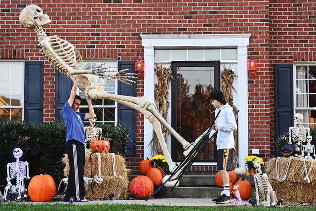 <p>Marvin Joseph/The Washington Post via Getty</p> Home Depot's 12-foot skeleton decoration.