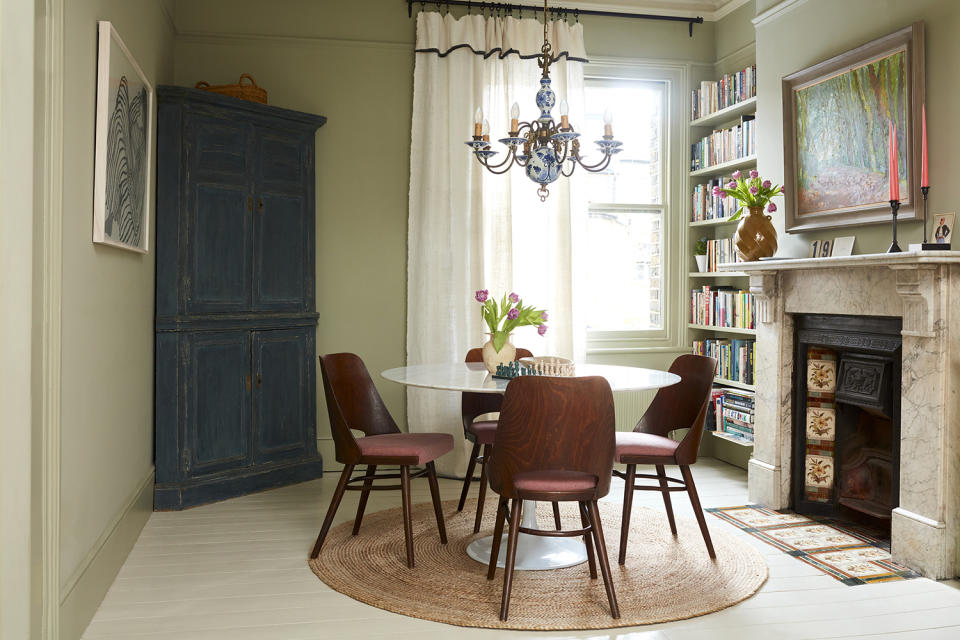 dining room with patterned curtains