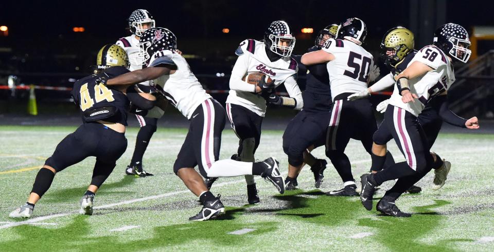 Elmira's Kayon Flint picks up yardage in a 31-14 win over Corning in the Section 4 Class AA football championship game Nov. 10, 2023 at Corning Memorial Stadium.