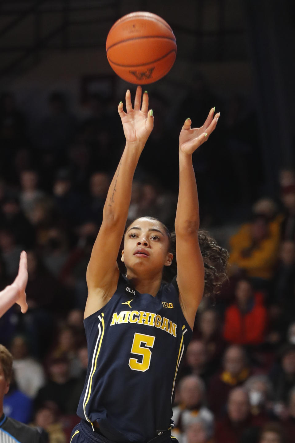 Michigan guard Laila Phelia (5) shoots against Minnesota in the third quarter of an NCAA college basketball game Sunday, Jan. 29, 2023, in Minneapolis. (AP Photo/Bruce Kluckhohn)