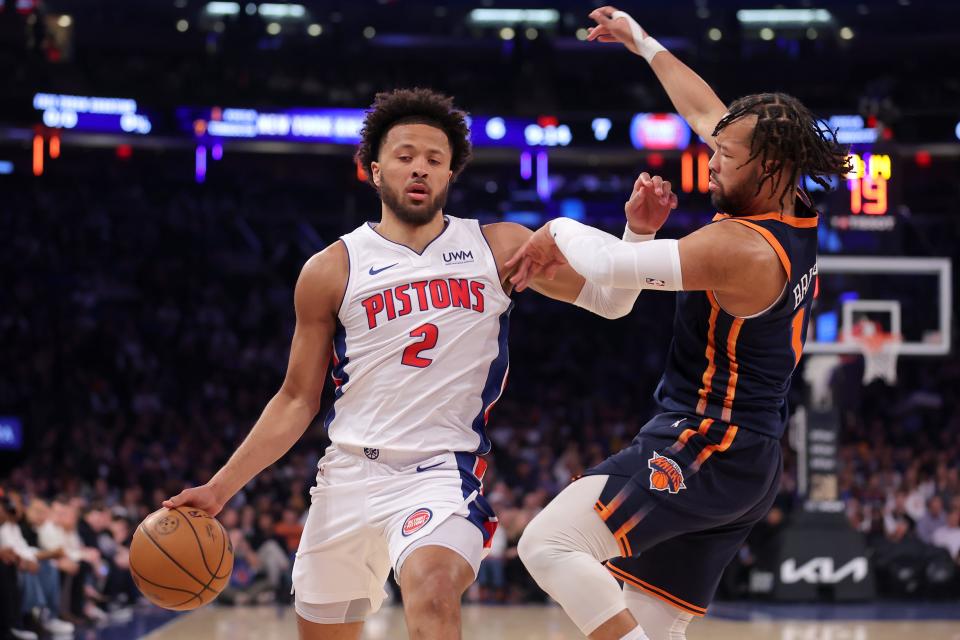 Detroit Pistons guard Cade Cunningham brings the ball up court against New York Knicks guard Jalen Brunson during the first quarter at Madison Square Garden on Monday, Feb 26, 2024 in New York, New York.