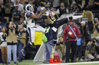 <p>Ted Ginn #19 of the New Orleans Saints makes a 43-yard catch against Lamarcus Joyner #20 of the Los Angeles Rams in the fourth quarter in the NFC Championship game at the Mercedes-Benz Superdome on January 20, 2019 in New Orleans, Louisiana. (Photo by Kevin C. Cox/Getty Images) </p>