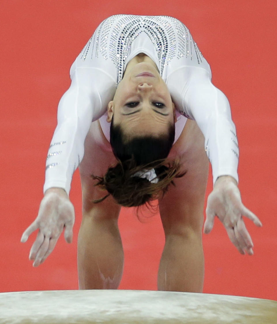 U.S. gymnast McKayla Maroney performs during the artistic gymnastics women's vault final at the 2012 Summer Olympics, Sunday, Aug. 5, 2012, in London. (AP Photo/Gregory Bull)