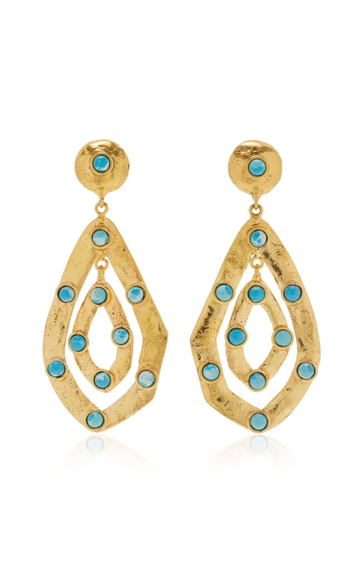 <p><a href="https://go.redirectingat.com?id=74968X1596630&url=https%3A%2F%2Fwww.modaoperandi.com%2Fwomen%2Fp%2Fsylvia-toledano%2Fava-earrings-3%2F613283&sref=https%3A%2F%2Fwww.townandcountrymag.com%2Fstyle%2Fjewelry-and-watches%2Fa60758855%2Fclip-on-earrings-expert-guide%2F" rel="nofollow noopener" target="_blank" data-ylk="slk:Shop Now;elm:context_link;itc:0;sec:content-canvas" class="link rapid-noclick-resp">Shop Now</a></p><p>Ava 22K Gold-Plated Larimar Earrings</p><p>$300.00</p>