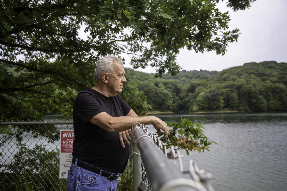 Image:  Bob Schmetzer, a resident and co-founder of the Beaver County Marcellus Awareness Community, an environmental advocacy group, looks out over a drinking water reservoir. (Hannah Rappleye / NBC News)
