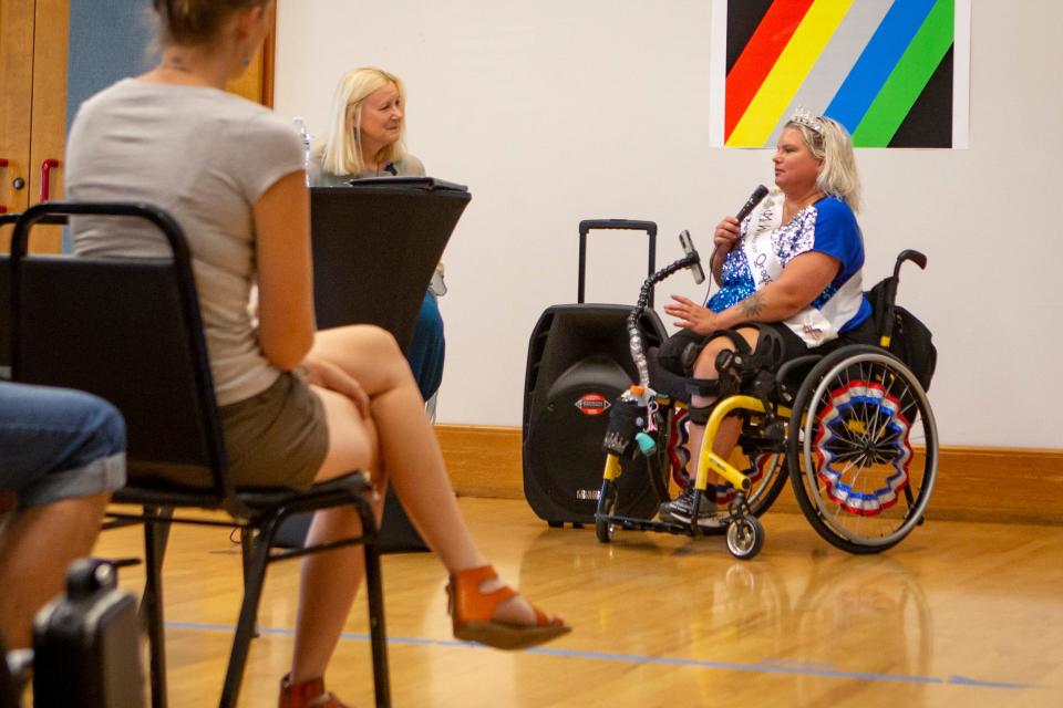 Melinda Preciado, Ms. Wheelchair Oregon, speaks to community members at a disability awareness festival on July 15 at Hilyard Community Center in Eugene.