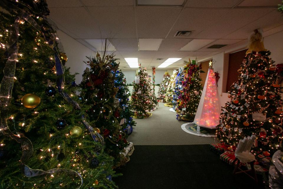 A wide assortment of Christmas Trees decorate the Sheboygan County Historical Research Center’s annex at the Treemendous Celebration holiday display as seen, Wednesday, November 30, 2022, in Sheboygan Falls, Wis.