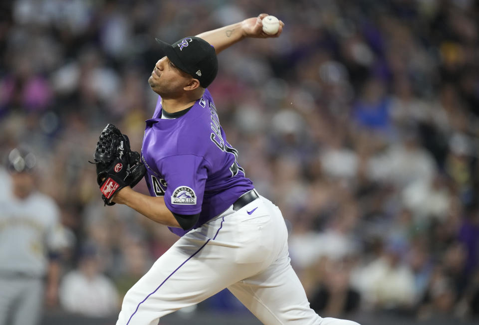 Colorado Rockies relief pitcher Jhoulys Chacin works against the Milwaukee Brewers during the fourth inning of a baseball game Saturday, June 19, 2021, in Denver. (AP Photo/David Zalubowski)