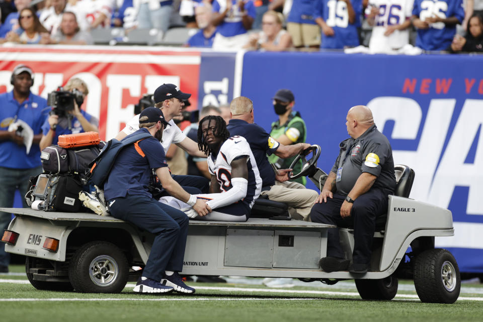 Denver Broncos wide receiver Jerry Jeudy (10) is carted off the field during the second half of an NFL football game against the New York Giants, Sunday, Sept. 12, 2021, in East Rutherford, N.J. (AP Photo/Adam Hunger)
