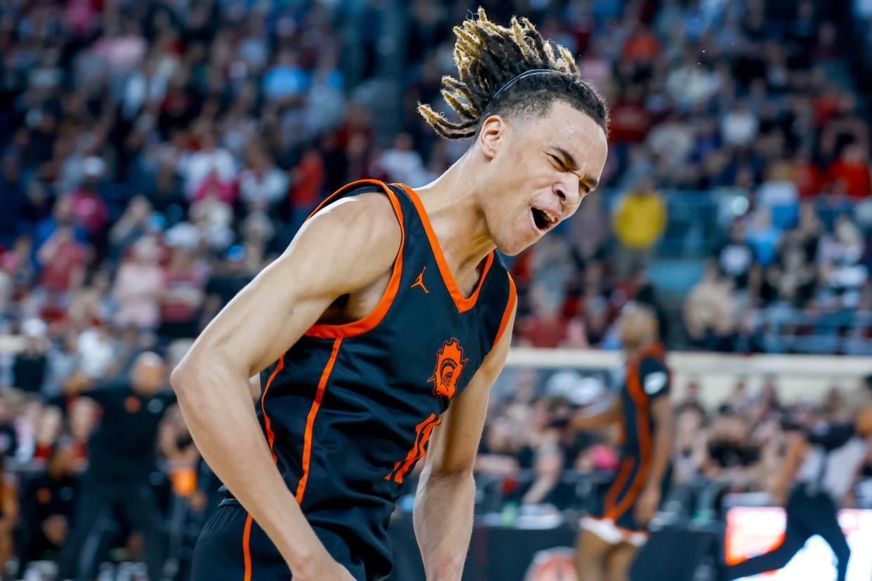 Douglass’ Davon Scott-Jones (11) celebrates scoring in overtime during the championship of the boys state basketball tournament between Douglass and Weatherford at the Jim Norick Arena in Oklahoma City, on Saturday, March 9, 2024.