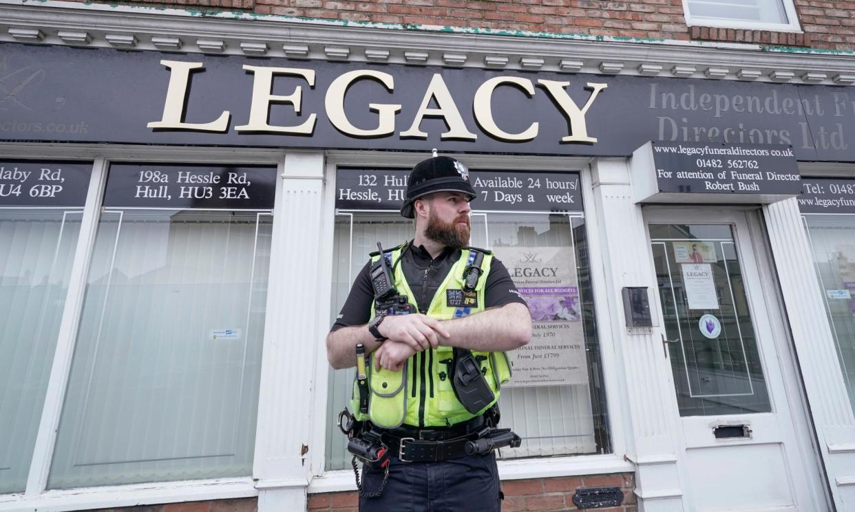 <span>Police said the bodies were ‘respectfully transported’ from Legacy Independent Funeral Directors’ Hessle Road branch to the city’s mortuary.</span><span>Photograph: Danny Lawson/PA</span>
