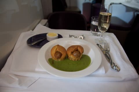 Toad in the hole, served with green matter (and fancy salt and pepper shakers) - Credit: Flickr - Noirin Shirley