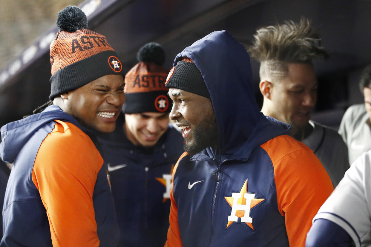 NEW YORK, NEW YORK - OCTOBER 23: Framber Valdez #59 and Cristian Javier #53 of the Houston Astros react in the dugout during the third inning against the New York Yankees  in game four of the American League Championship Series at Yankee Stadium on October 23, 2022 in the Bronx borough of New York City. (Photo by Sarah Stier/Getty Images)