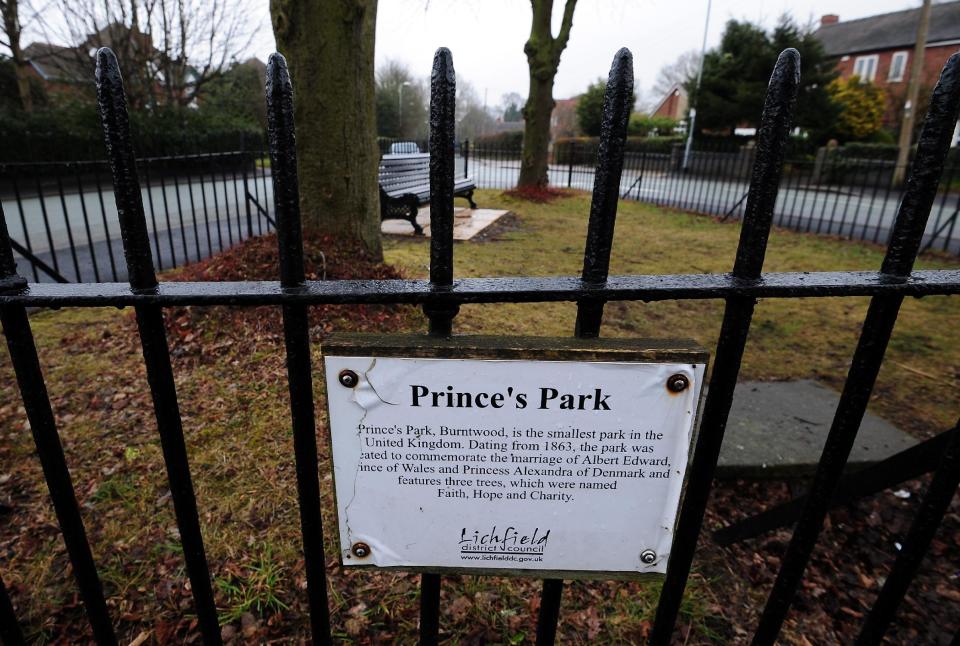 A sign recording the fame of Britain's smallest park in Burntwood, Staffordshire, England, created to commemorate the marriage of Albert Edward Prince of Wales to Princess Alexandra of Denmark in 1863 and naming the trees as Faith, Hope and Charity, seen on Friday April 12, 2013. Prince's Park was created to commemorate the marriage of Albert Edward Prince of Wales to Princess Alexandra of Denmark in 1863, before Albert Edward became Britain's King Edward VII on the death of his mother Queen Victoria. The British and the Americans are quarreling over who has the world's smallest park, the one in Portland, Ore. USA, is essentially a concrete planter about 2-feet in diameter, the other is this park about 5,000 miles away, in England where they dispute whether Portland's smallest park is a park at all. (AP Photo / Rui Vieira, PA) UNITED KINGDOM OUT - NO SALES - NO ARCHIVES