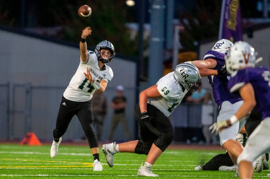 Emerald Ridge quarterback Jake Schakel attempts a pass during the second quarter of a 4A SPSL game against Sumner on Friday, Sept. 16, 2022, at Sunset Chev Stadium in Sumner, Wash.