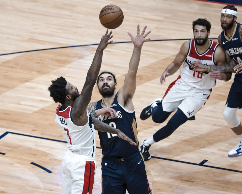 Washington Wizards guard Bradley Beal (3) shoots over New Orleans Pelicans center Steven Adams (12) in the second quarter of an NBA basketball game in New Orleans, Wednesday, Jan. 27, 2021. (AP Photo/Derick Hingle)