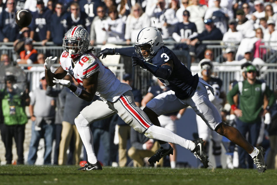 Ohio State and Penn State would meet for the second time in 2022 if there was a 12-team playoff in place this season.  (AP Photo/Barry Reeger)