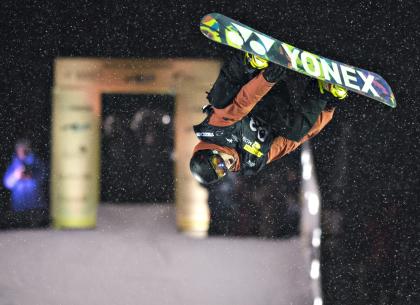 Antoine Truchon leaps to a third-place finish in during the snowboard big air final Friday, Jan. 17, 2014, in Quebec City. (AP Photo/The Canadian Press, Jacques Boissinot)