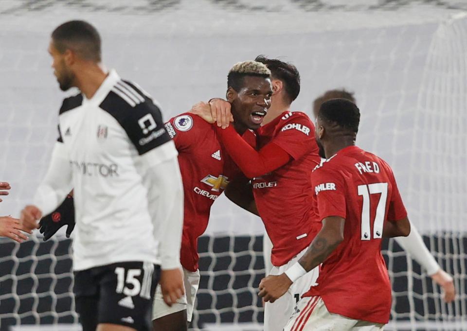 Paul Pogba celebrates his brilliant strike (Reuters)