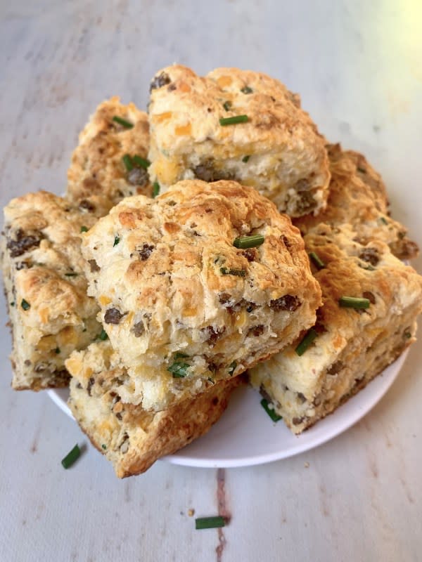 <p>Big Delicious Life</p><p>These fluffy buttermilk biscuits are studded with crumbled sausage and sharp cheddar cheese. Perfect on their own, with butter or split and topped with a fried egg for a full home-cooked breakfast.</p><p><strong>Get the Recipe:</strong><a href="https://bigdeliciouslife.com/sausage-cheddar-biscuits/" rel="nofollow noopener" target="_blank" data-ylk="slk:Sausage Cheddar Biscuits;elm:context_link;itc:0;sec:content-canvas" class="link "> <strong>Sausage Cheddar Biscuits</strong></a></p>