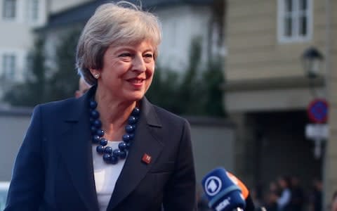 Theresa May talks to the media as she arrives for the informal meeting of European Union leaders ahead of the EU summit, in Salzburg, Austria - Credit: LISI NIESNER /Reuters