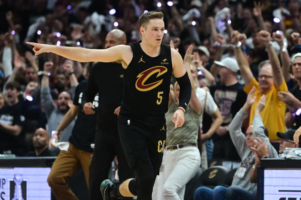 Cavaliers guard Sam Merrill celebrates after hitting a second-quarter 3-point against the Magic in Game 7 of a first-round playoff series, May 5, 2024, in Cleveland.