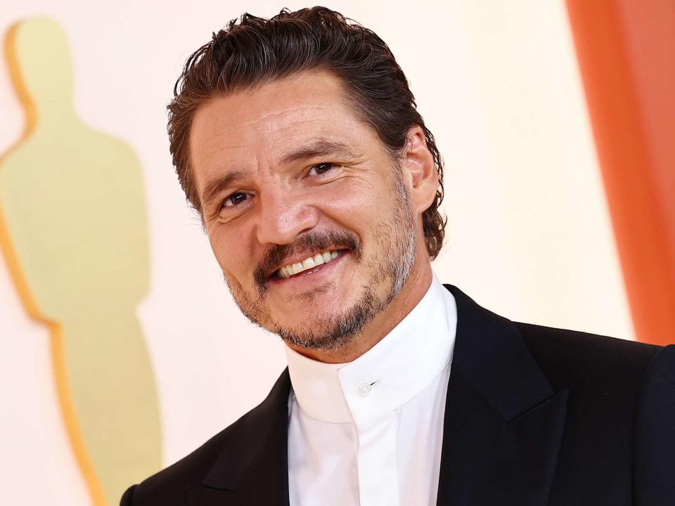 <p>Arturo Holmes/Getty</p> Pedro Pascal attends the 95th Annual Academy Awards