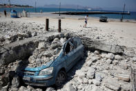 <p>A car is seen under the debris of a collapsed building, after an earthquake off the island of Kos, Greece July 21, 2017. (Photo: Costas Baltas/Reuters) </p>