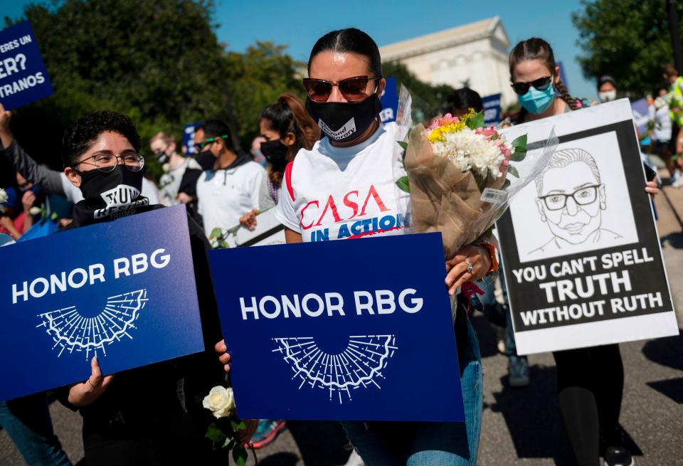 Members of the immigrant advocacy group CASA march in protest around the Supreme Court as President Donald Trump prepares to quickly fill Ruth Bader Ginsburg's seat with a conservative nominee. (ANDREW CABALLERO-REYNOLDS via Getty Images)