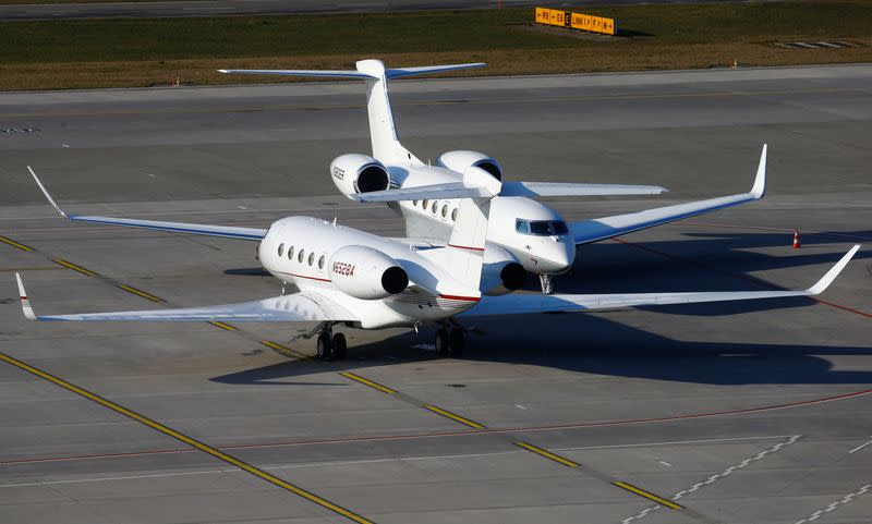 Two Gulfstream GVI G650 GLF6 business aircrafts are parked at the airport in Zurich