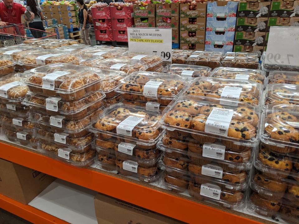 Packs of Muffins displayed on a table for sale at Costco