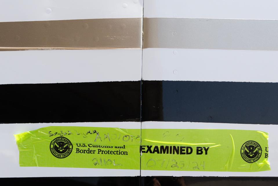 A plane with a U.S. and Customs and Border Protection tag is shown on a plane in which alleged Sinaloa Cartel leaders, Ismael "El Mayo" Zambada and Joaquin Guzman Lopez, landed in Dona Ana County International Jetport aboard this airplane. The two men were taken under U.S. custody in New Mexico July 25, 2024.