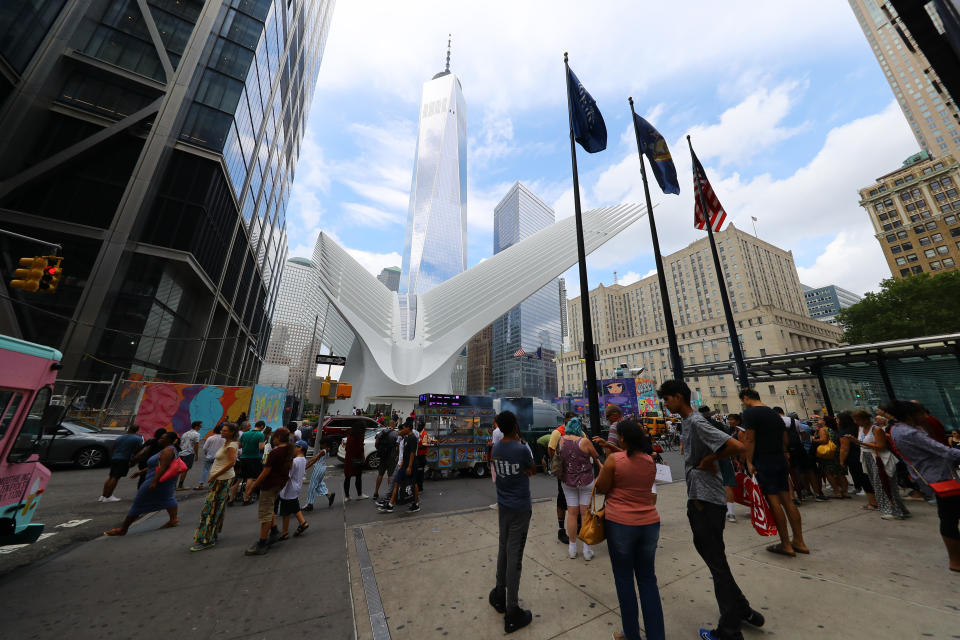 <p>People gather outside the Millennium Hilton on Church Street across from the Oculus on Aug. 18, 2018. (Photo: Gordon Donovan/Yahoo News) </p>