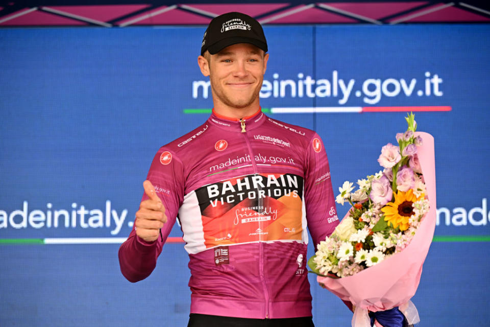 BERGAMO ITALY  MAY 21 Jonathan Milan of Italy and Team Bahrain  Victorious  Purple Points Jersey celebrates at podium during the 106th Giro dItalia 2023 Stage 15 a 195km stage from Seregno to Bergamo  UCIWT  on May 21 2023 in Bergamo Italy Photo by Stuart FranklinGetty Images