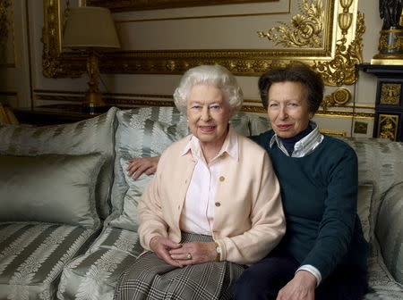 Britain's Queen Elizabeth II is pictured with her daughter, The Princess Royal, in the White Drawing Room at Windsor Castle, in this official photograph released by Buckingham Palace to mark her 90th birthday, April 20, 2016. Credit must read: c2016 Annie Leibovitz/Handout