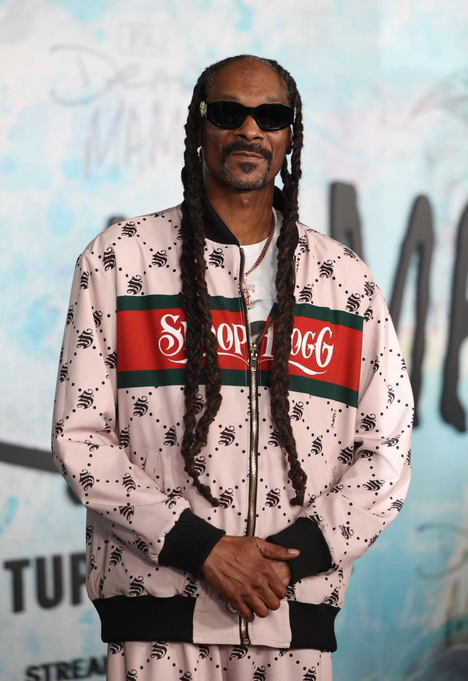 Snoop Dogg wearing grey.