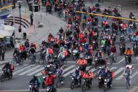 Delivery workers for Rappi and other delivery apps protest as part of a strike to demand better wages and working conditions, amid the coronavirus disease (COVID-19) outbreak, in Bogota