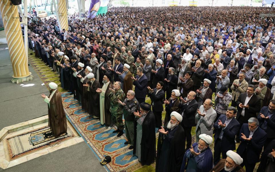 Iranians at noon prayers in Tehran on Friday as the world appealed for calm in the confrontation with Israel