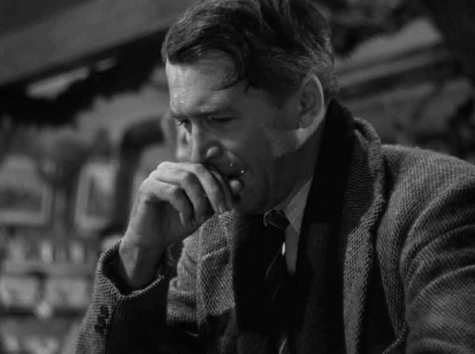 a black and white photo of character george bailey in its a wonderful life captain america comparison