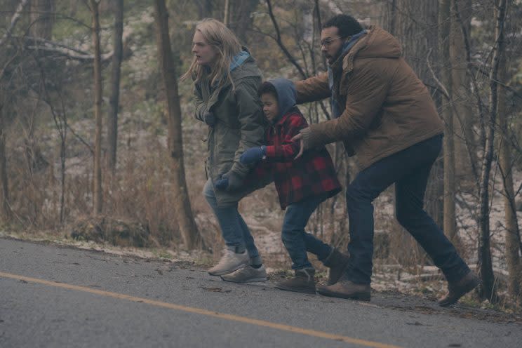 Elisabeth Moss as Offred, Jordana Blake as Hannah and O-T Fagbenle as Luke in Hulu's The Handmaid's Tale. (Credit: George Kraychyk/Hulu)