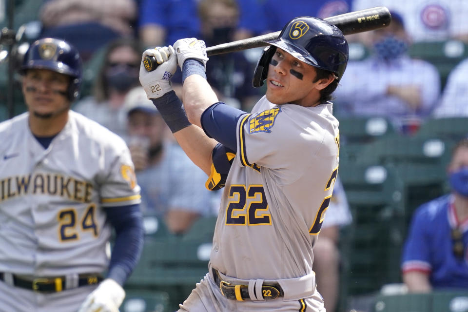 Milwaukee Brewers' Christian Yelich watches after hitting a double against the Chicago Cubs during the fourth inning of a baseball game in Chicago, Wednesday, April 7, 2021. (AP Photo/Nam Y. Huh)
