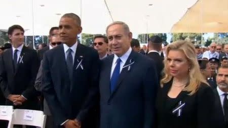 A still image from a video showing U.S. President Barack Obama and Prime Minister Benjamin Netanyahu ahead of the funeral of former Israeli President Shimon Peres in Jerusalem September 30, 2016. REUTERS/Pool via Reuters TV