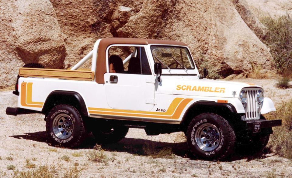 <p>Jeep forums are clogged with speculative posts about a possible pickup truck version of the next Wrangler. Enthusiasts have yearned for the return of the Jeep pickup for decades-ever since this one went away. In the early 1980s, Jeep needed a small pickup to compete in that new market segment. So it transformed the popular CJ-7 into something more suitable for hauling by stretching the wheelbase 10 inches and grafting on a longer pickup truck-like body with wooden stake bedsides. It was called the CJ-8, or simply the Scrambler. The Scramblers were much nicer to drive than the CJs, largely because that longer wheelbase helped to smooth out the ride. Fewer than 30,000 Scramblers were built, so their value today is on the rise.</p>